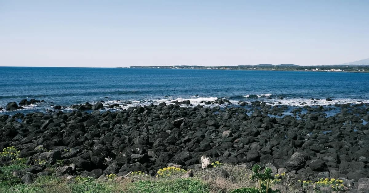 Jeju Island volcanic coast ocean summer bright warm